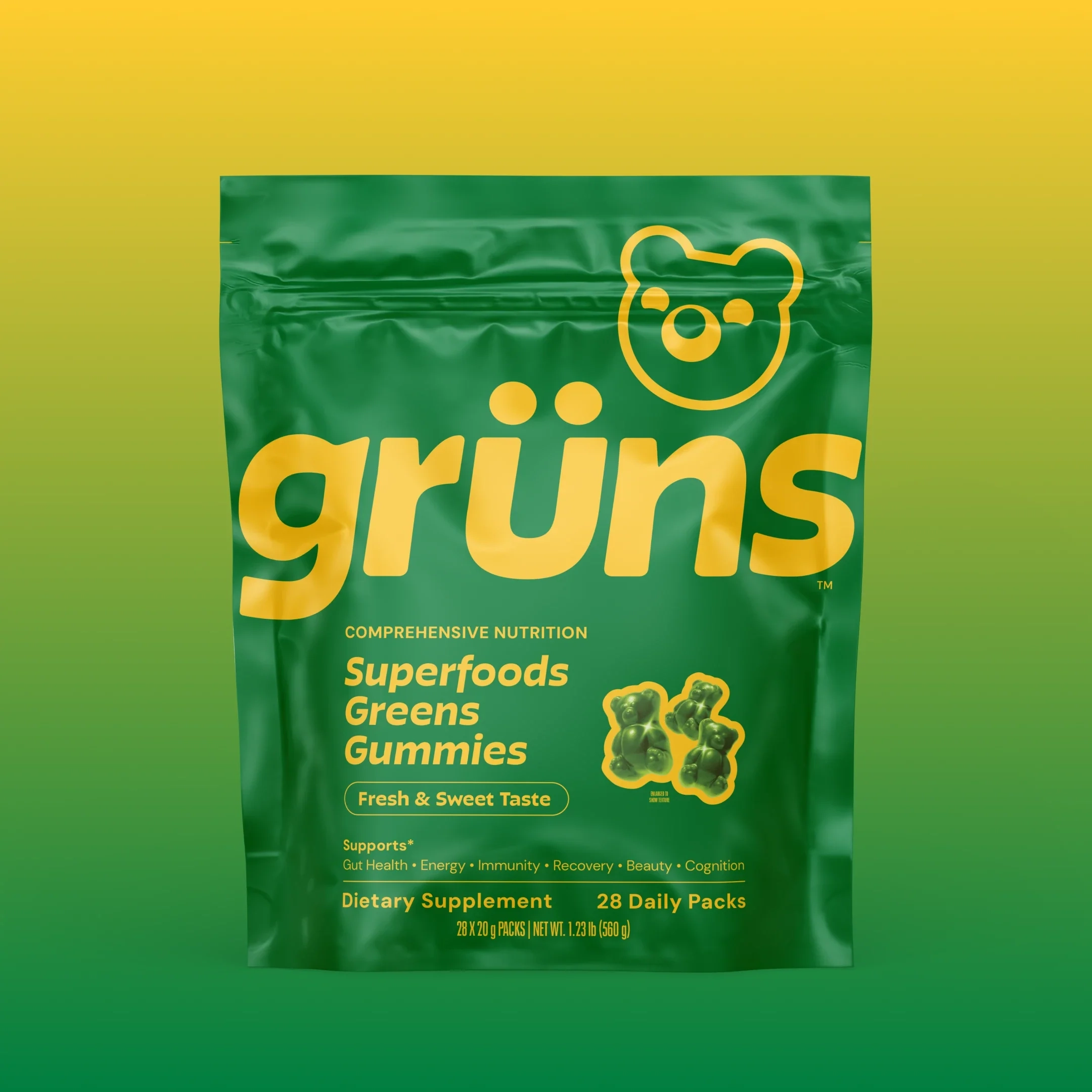 Grüns Original Adults pouch on a green-to-yellow background
